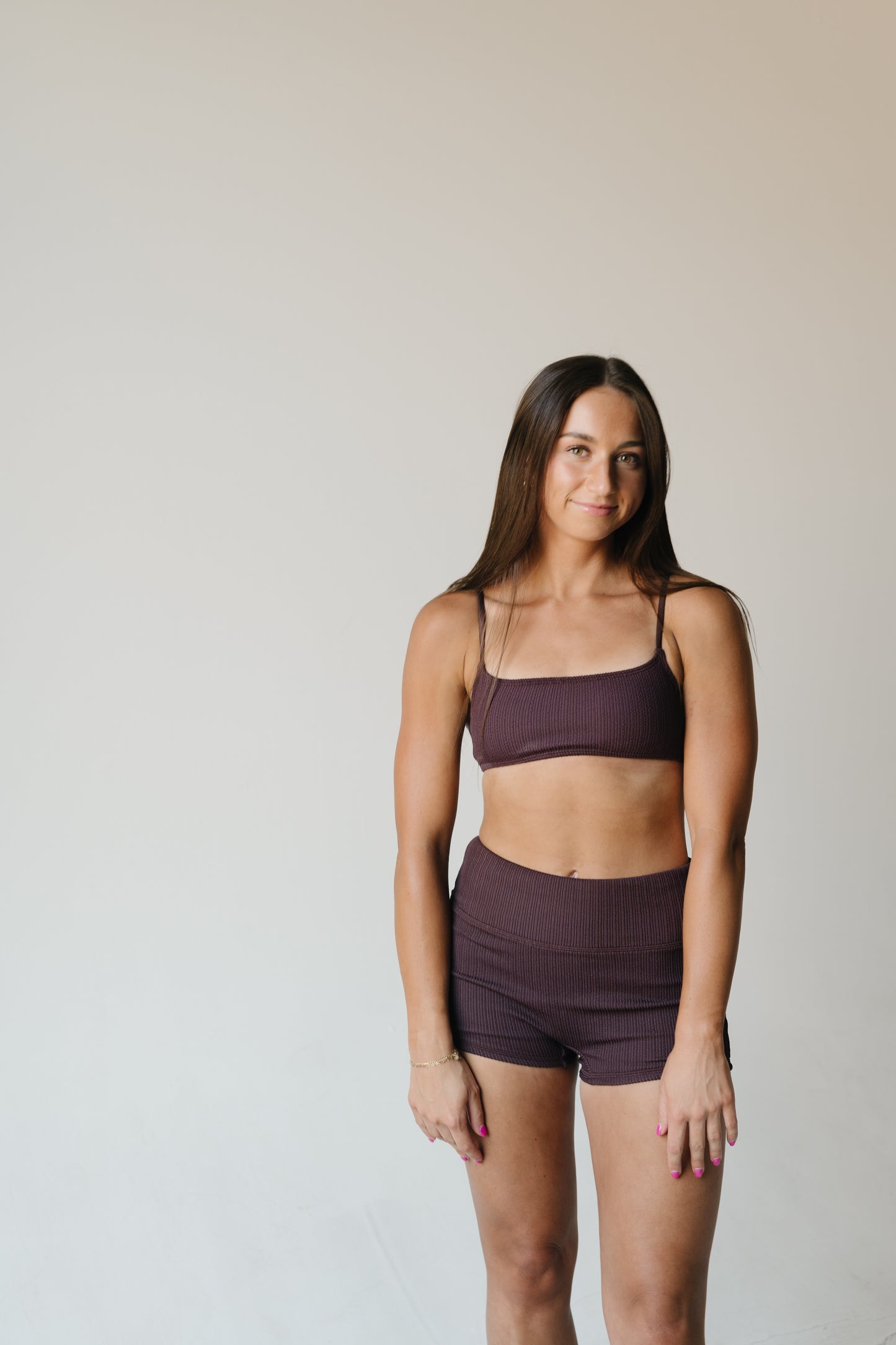 Beachside lifestyle shot highlighting subtle medium glow from Bronzing Bods tan
